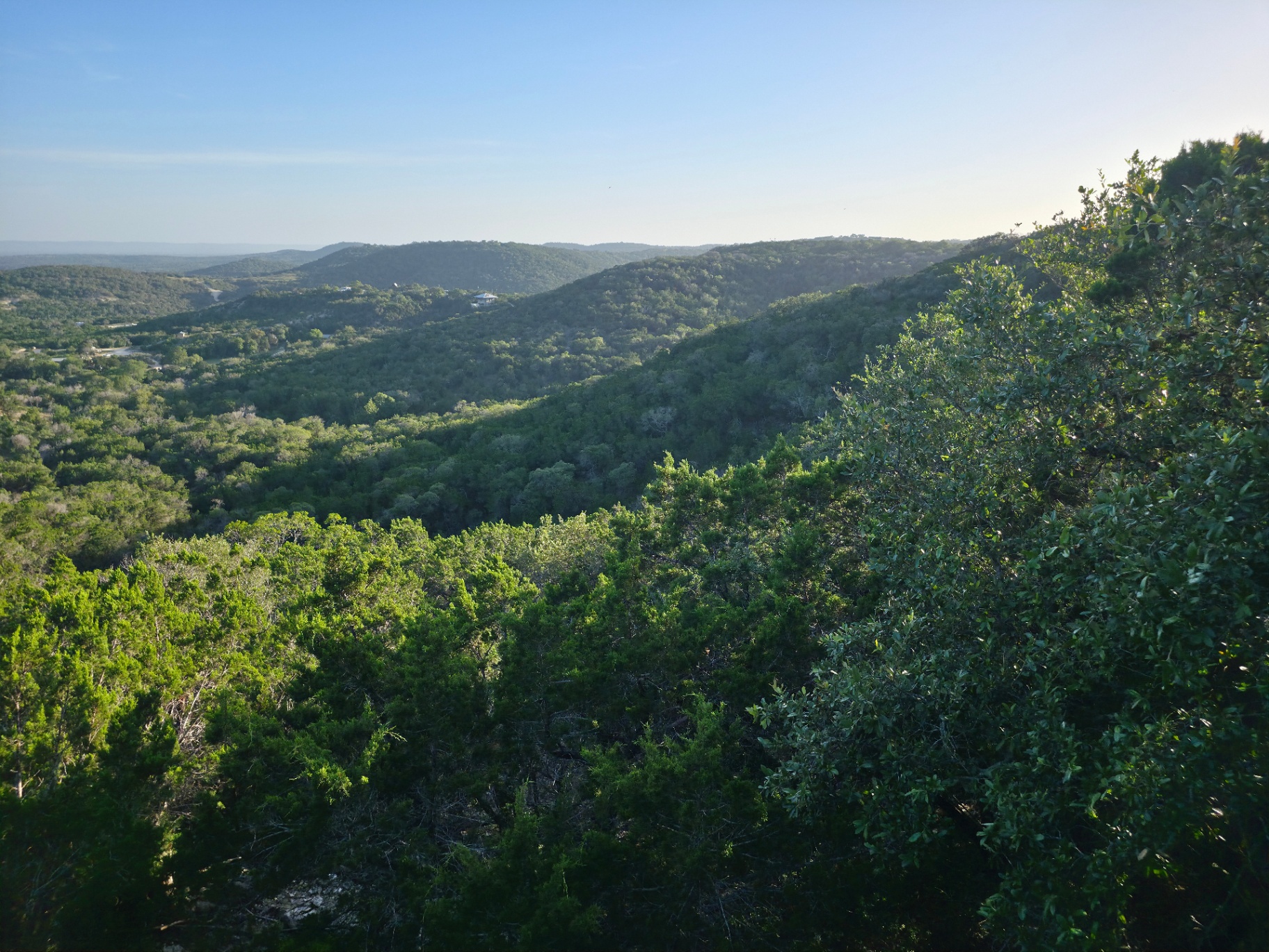 Panoramic 20-mile view of the Texas Hill Country valley and distant ridgelines